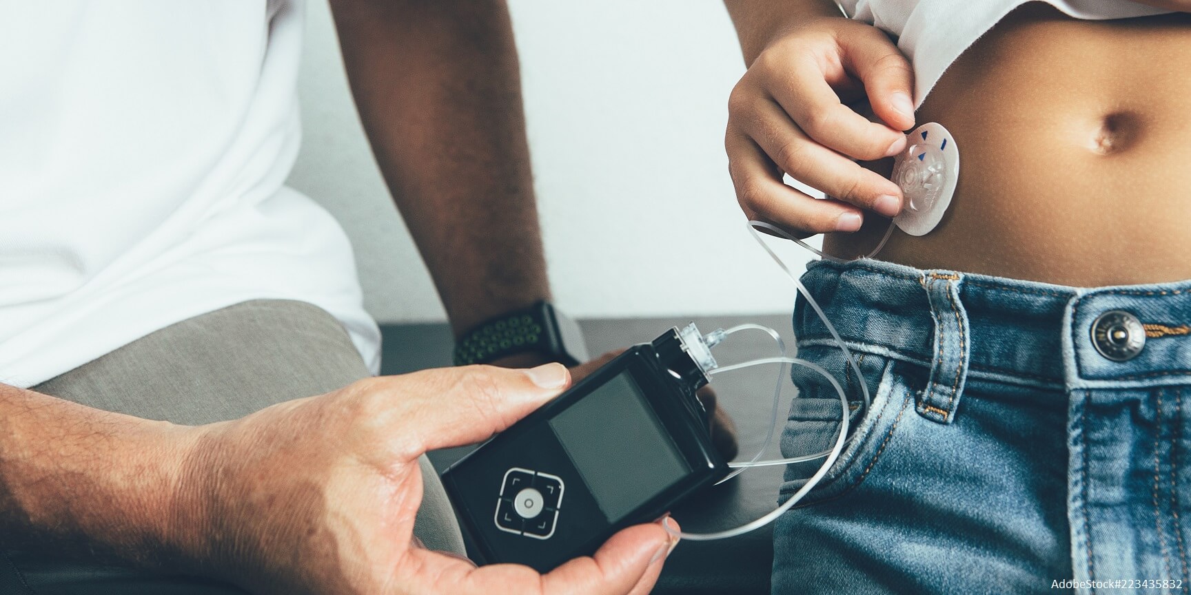 Kind mit Insulinpumpe